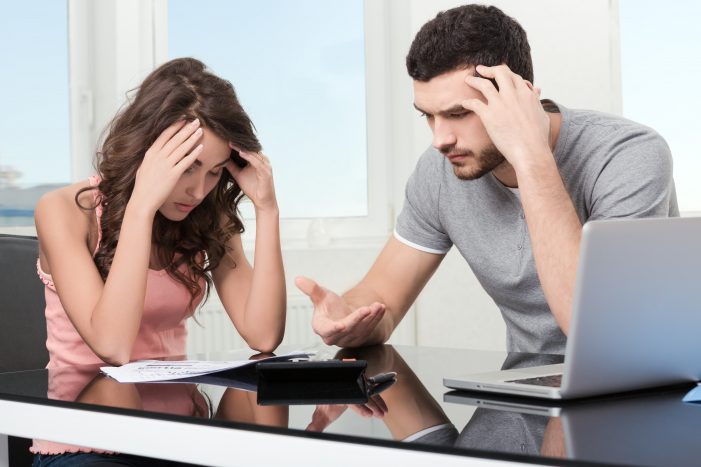 Fix My Credit - Couple having financial problems